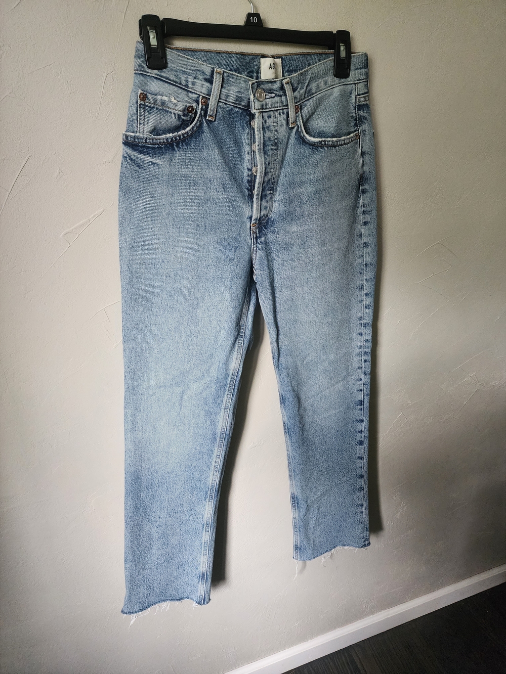 AGOLDE women's light-wash straight-leg jeans with a raw hem Size 25